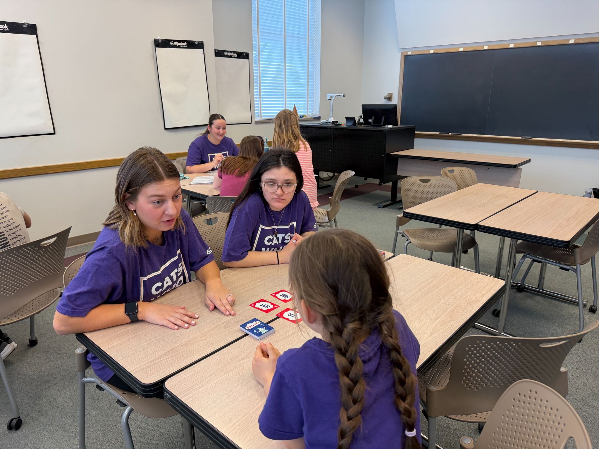UNI students working with youth on Math 